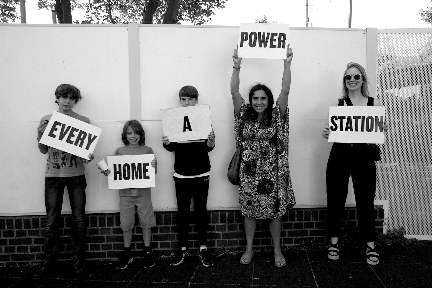 a group of people holding placards