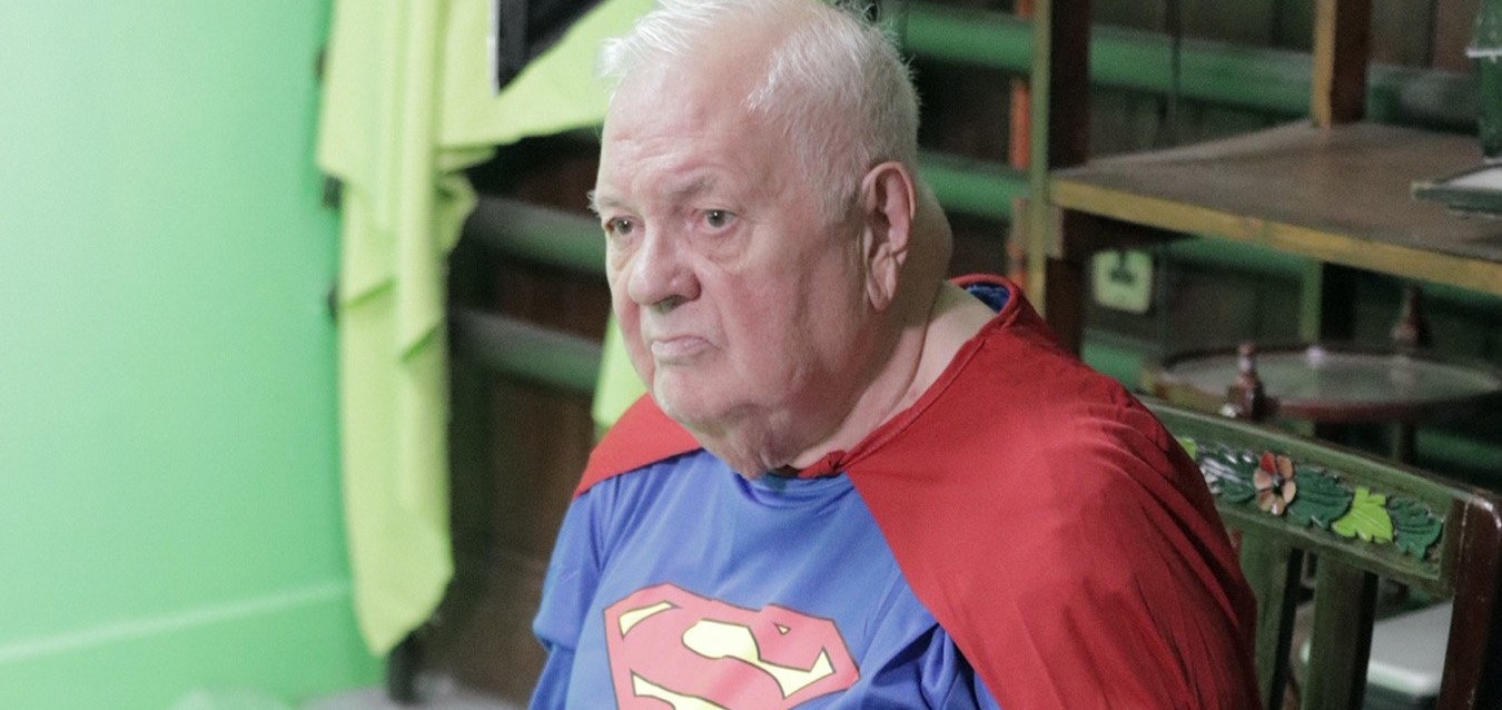 elderly man in superhero costum