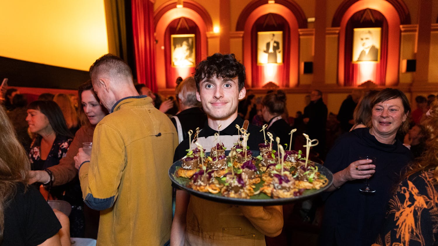 Waiter with food at Folkestone silver screen cinema event