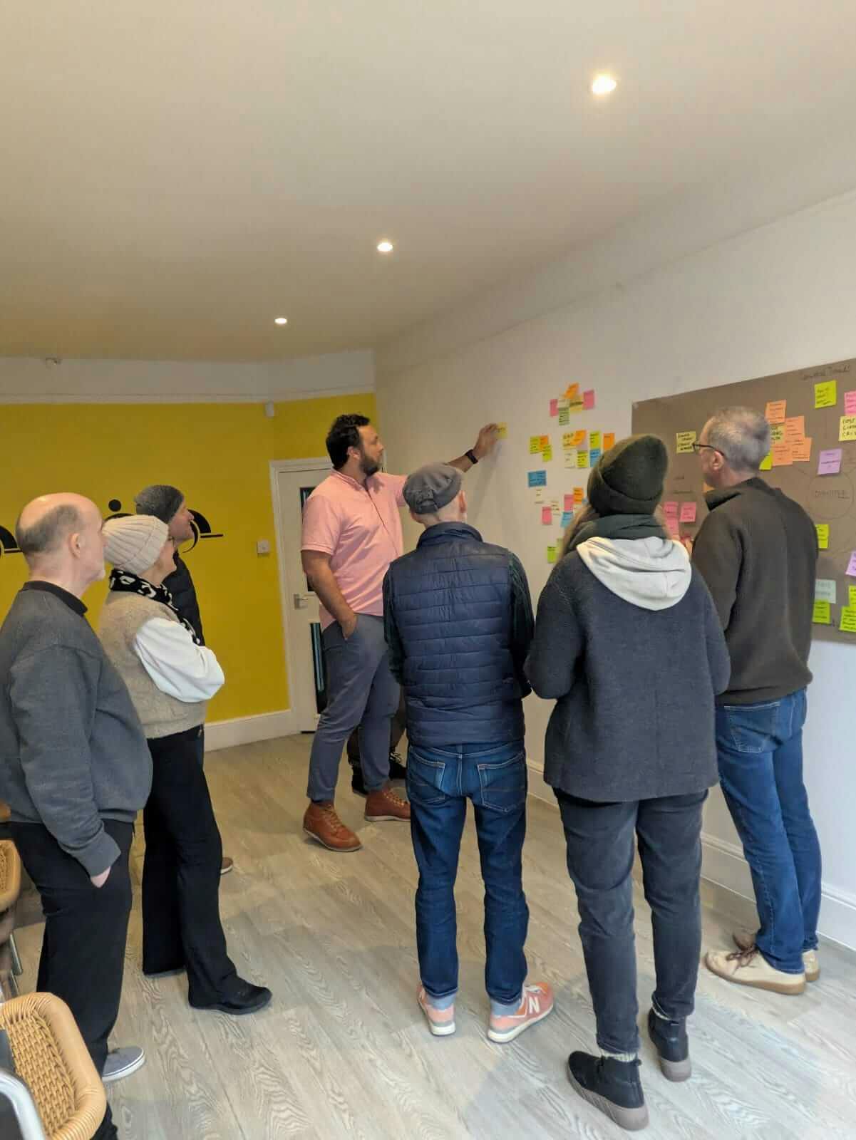 The Folkestone Sea Sauna team is in discussion at the group workshop