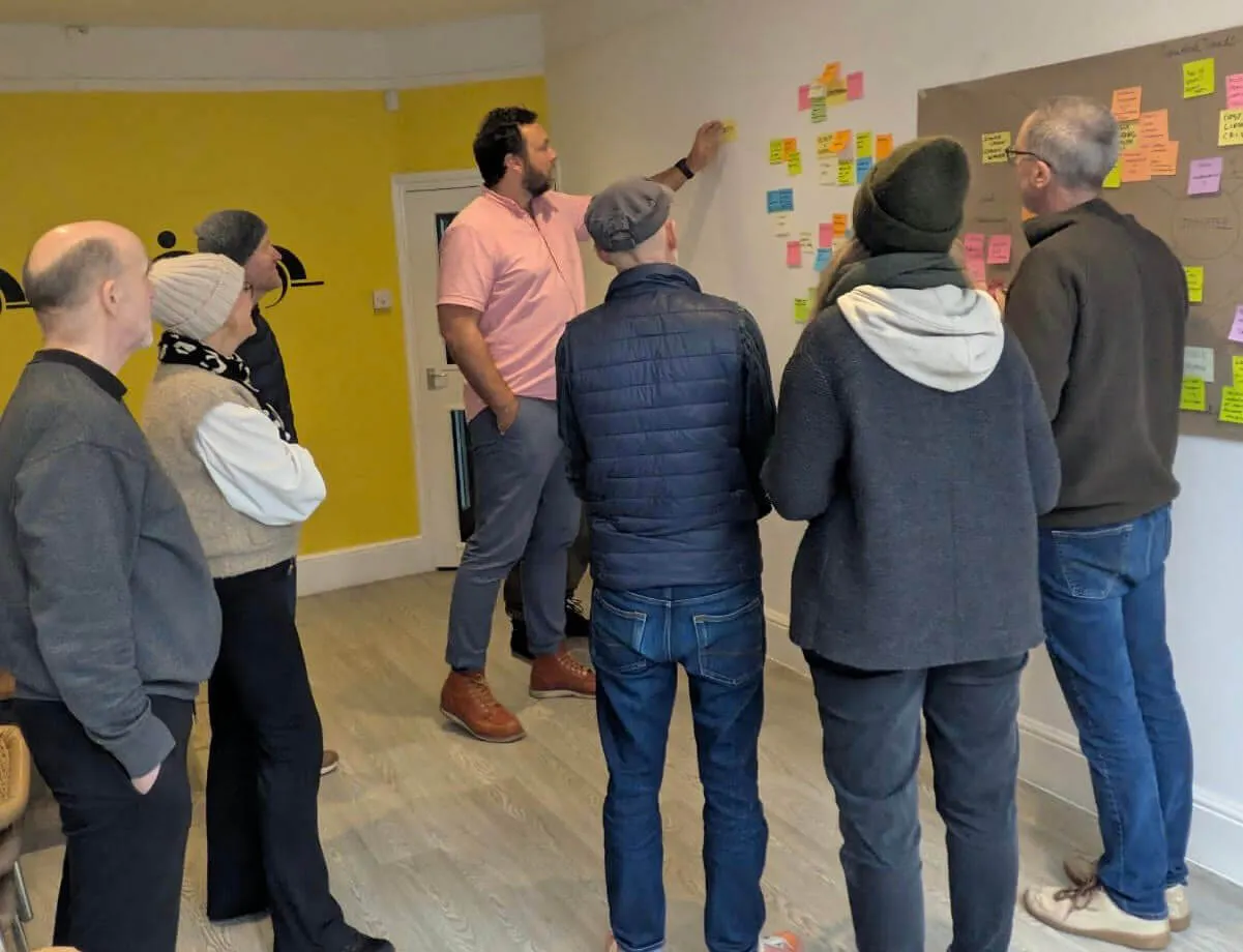 The Folkestone Sea Sauna team is in discussion at the group workshop