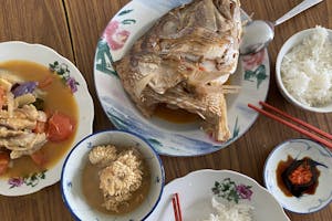 A homecooked meal by grandmother, with Assam fish that turned into three dishes.