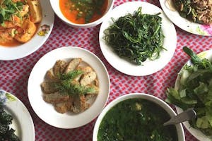 plates of food laid out on table, flatlay-style