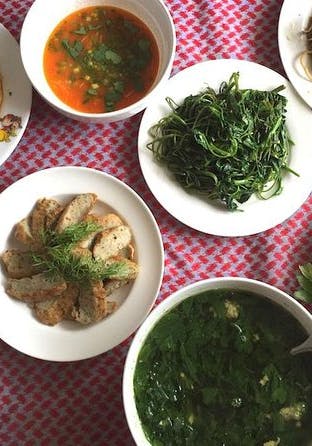 plates of food laid out on table, flatlay-style