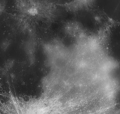 A black and white close-up of the moon's surface