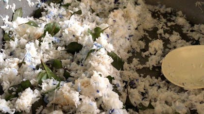 closeup image of butterfly pea flower infused rice