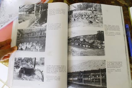 Book with pictures on farming in Singapore in 1960s.