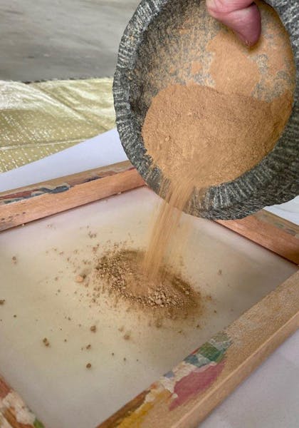 Preparing the sieve the dried and grounded soil 