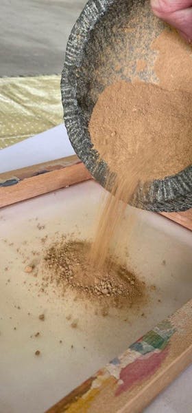 Preparing the sieve the dried and grounded soil 