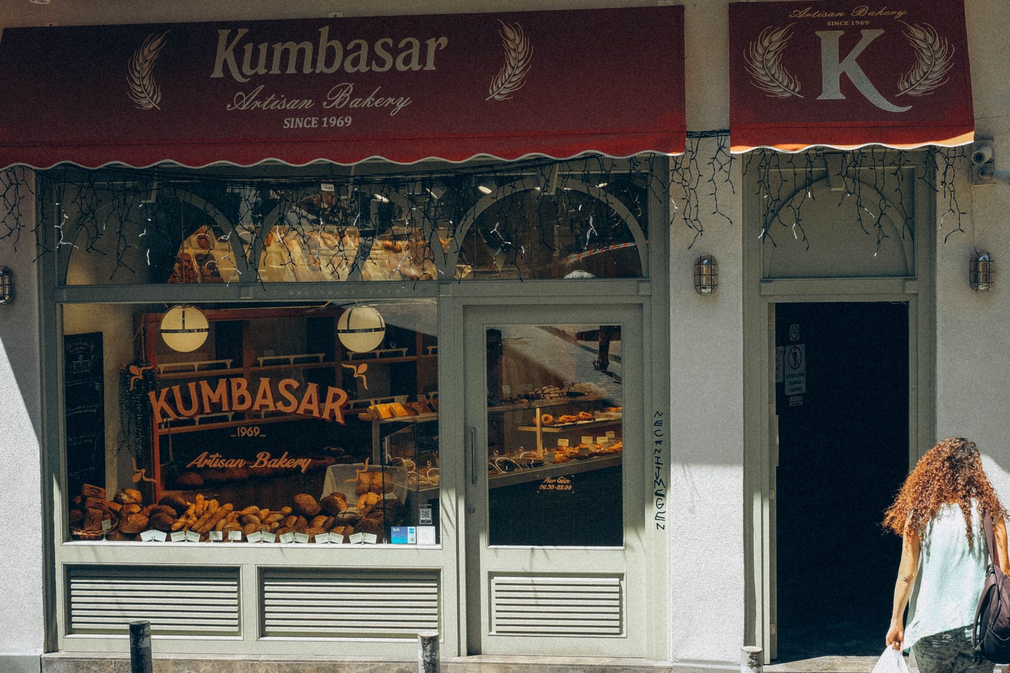 An artisan bakery shopfront with bread and pastries on display