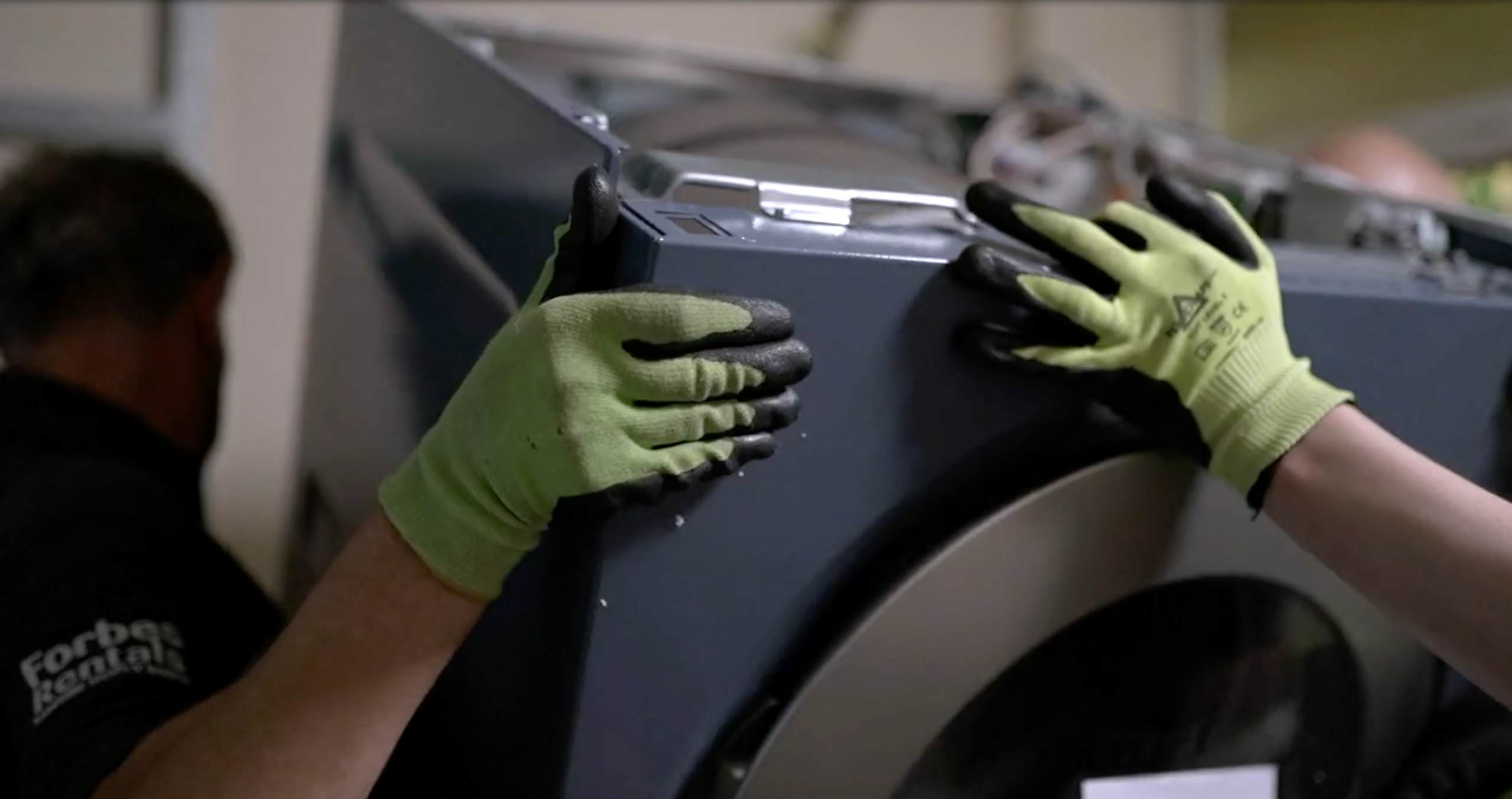 Forbes Professional Engineers Installing Commercial Washer