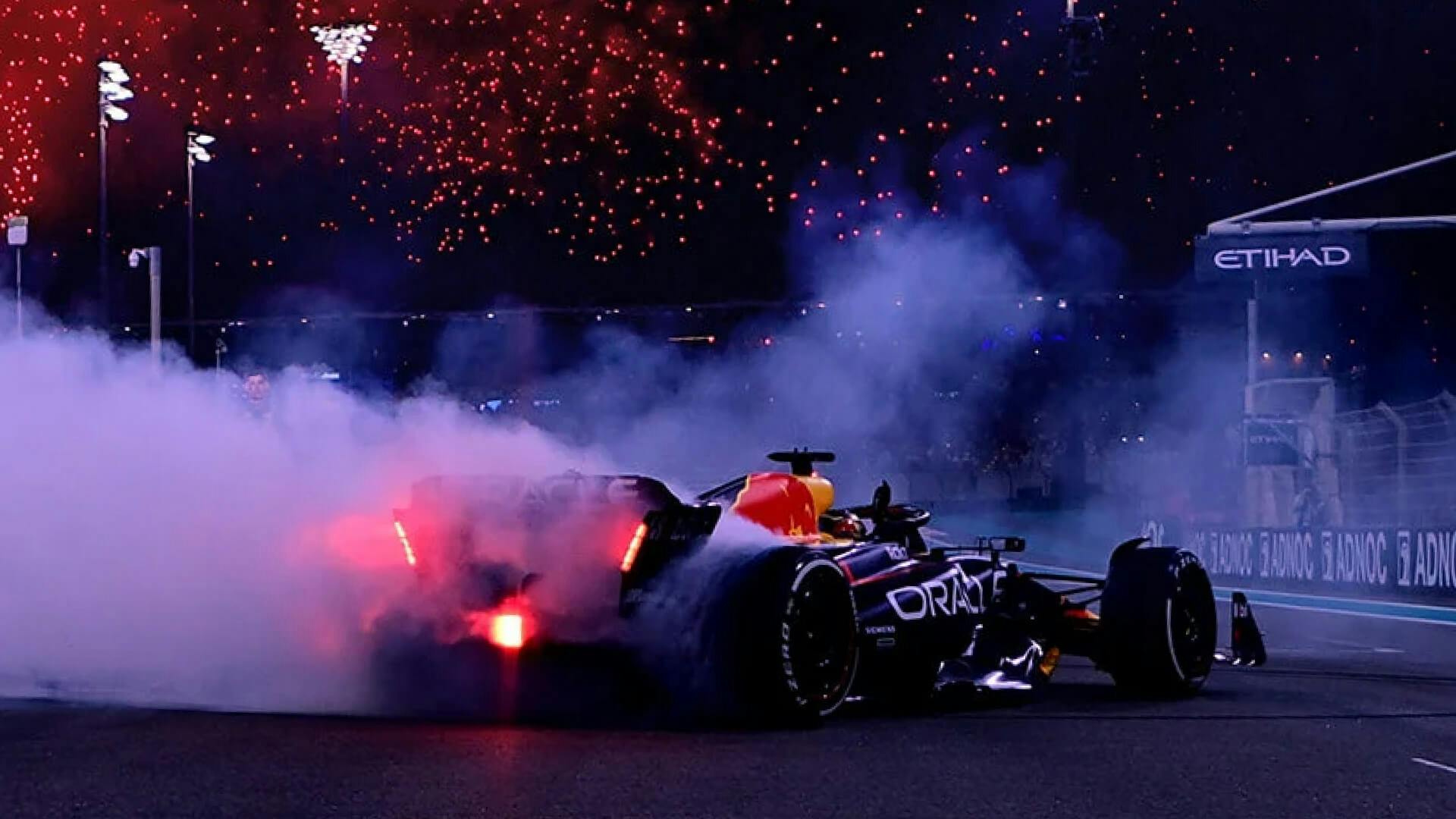 Verstappen celebrating his championship with a burnout during the finale of the 2023 F1 season