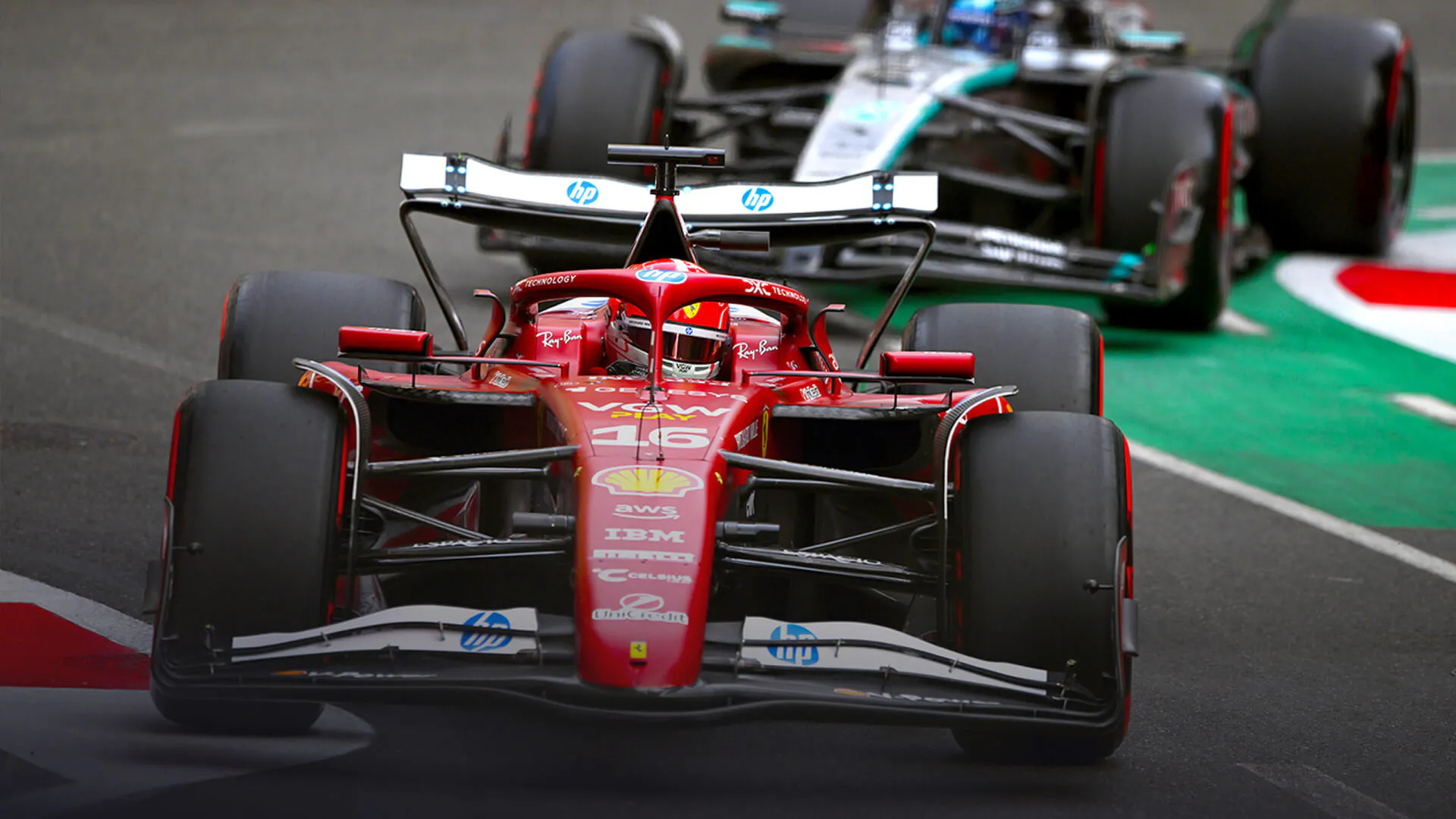 Charles Leclerc in his Ferrari leading a Mercedes at Baku.