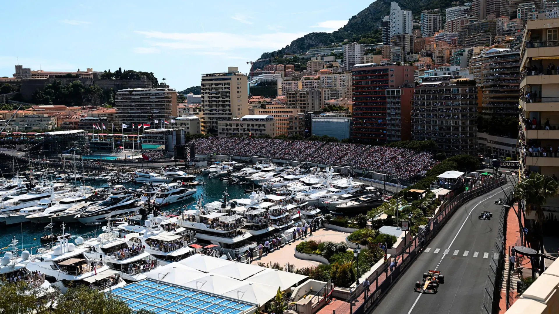 Formula 1 cars racing through Monte Carlo during the Monaco Grand Prix