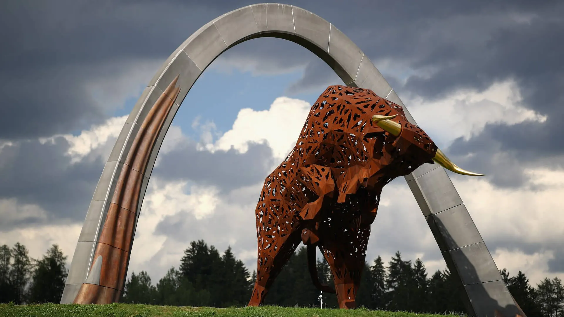 Austrian Grand Prix Race Week graphic featuring the Red Bull Ring bull sculpture, circuit outline, and event dates.