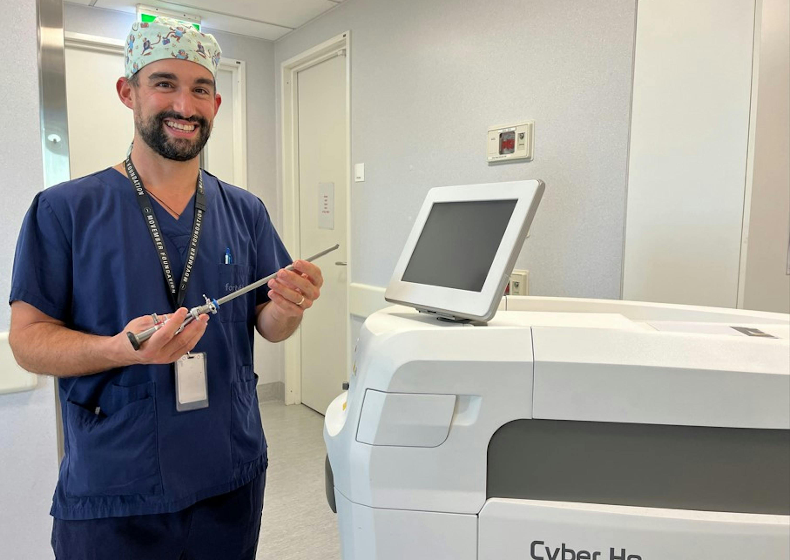 Urological Surgeon Giovanni Losco with the laser machine used for the HoLEP surgery at Forte Health.
