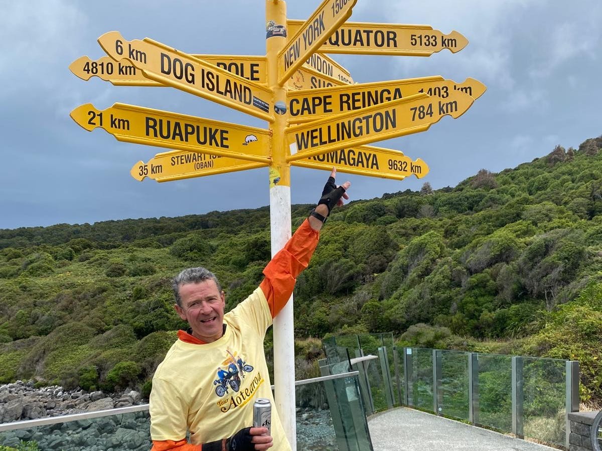 A picture of David Barker at the end of the Tour Aotearoa bike ride.