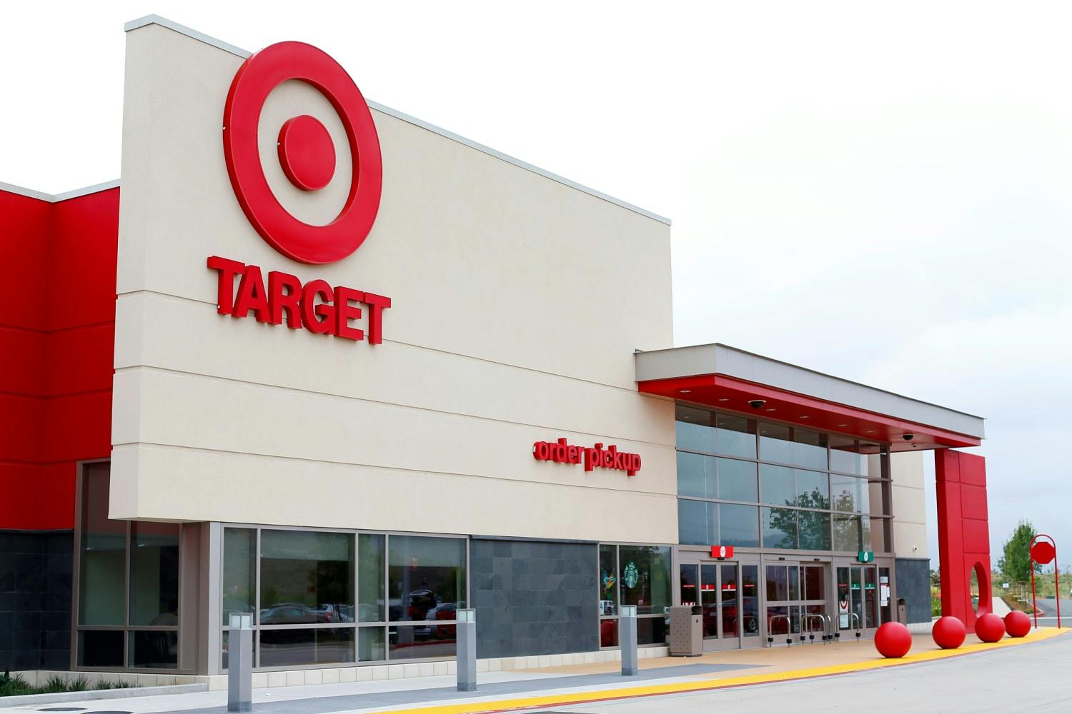 A Target store exterior with the Target logo and "order pickup" sign.