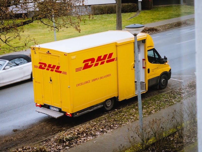 DHL truck is going to Canada from the United States