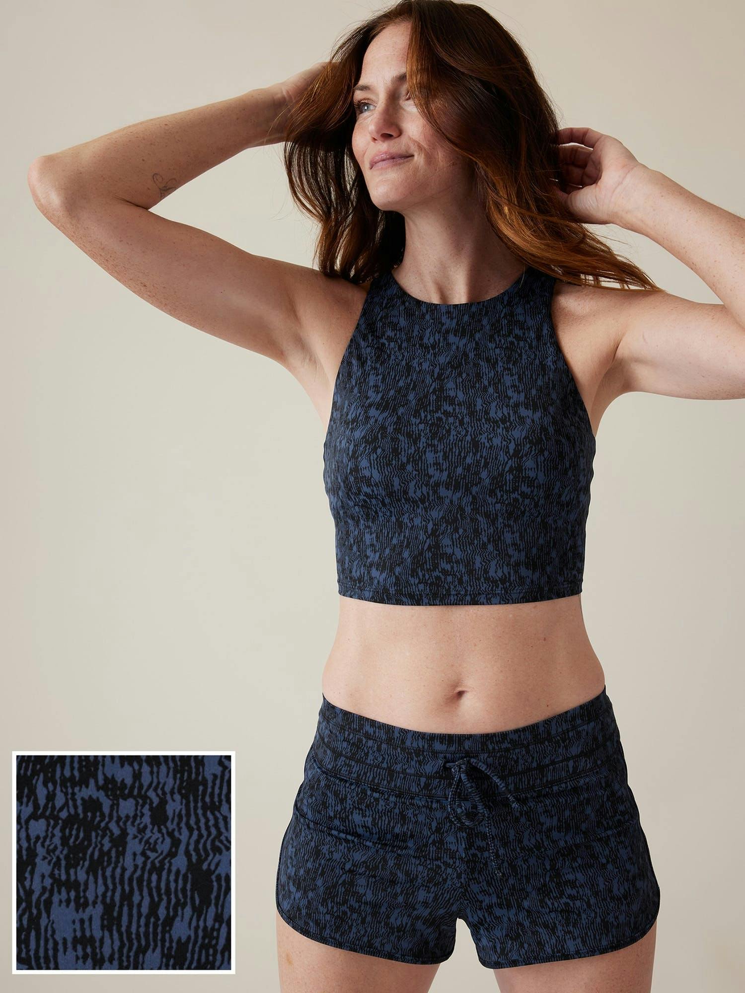 A woman wearing Athletta crop. A woman wearing Athletta crop.
