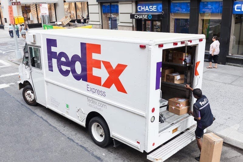 FedEx truck is going to Canada from the United States