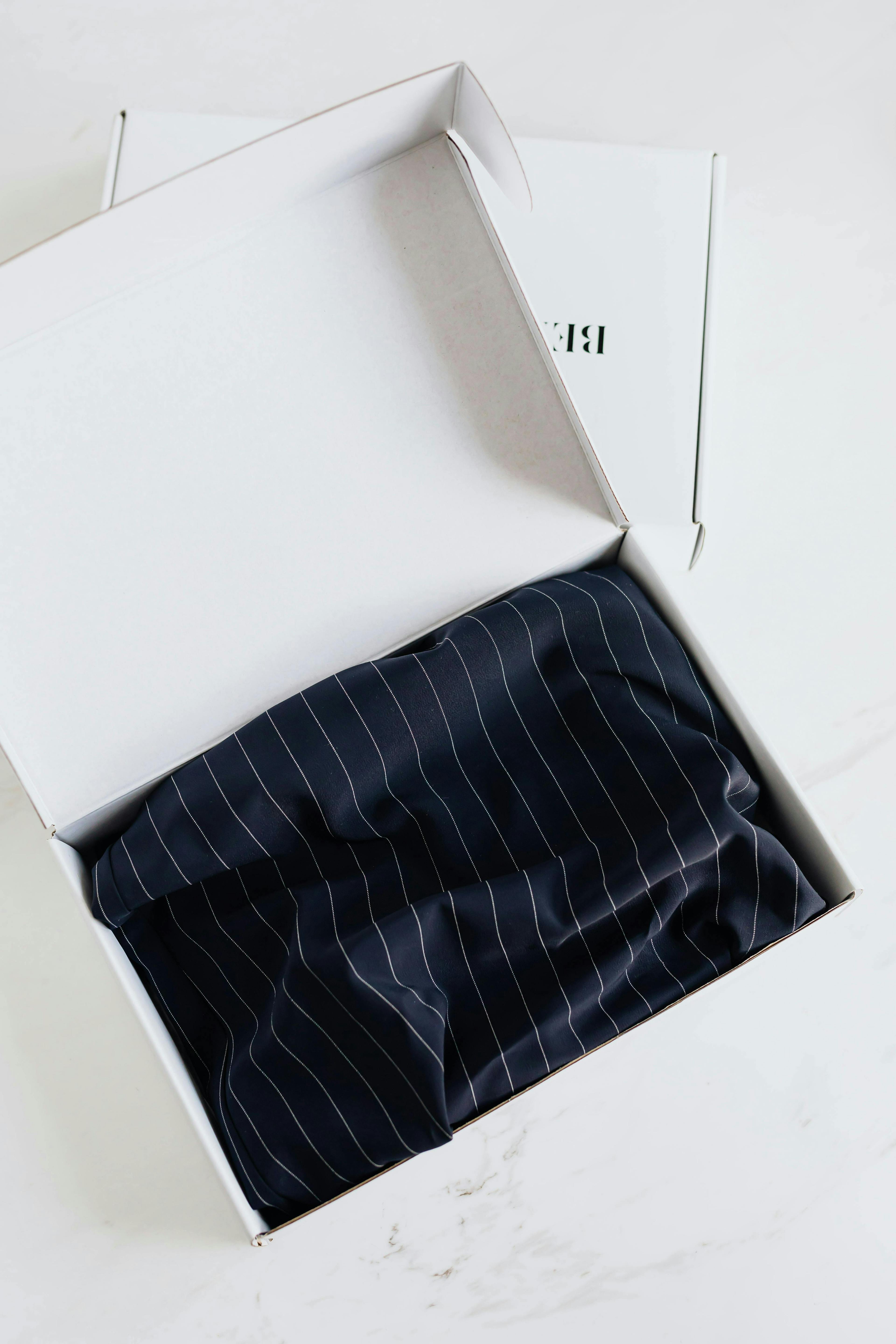 Ralph Lauren item in a white shipping package representing high-end packing. Ralph Lauren item in a white shipping package representing high-end packing.