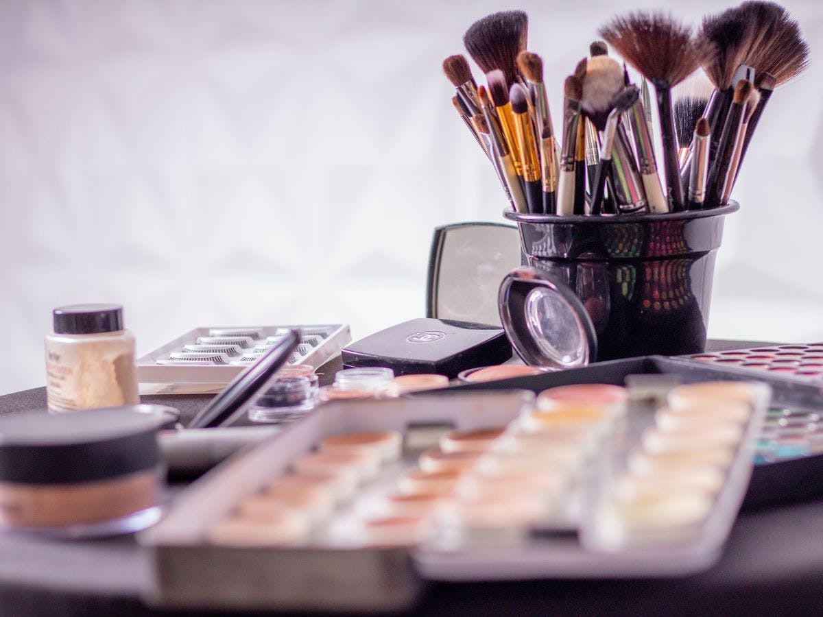 A few make-up produt over a white background. 