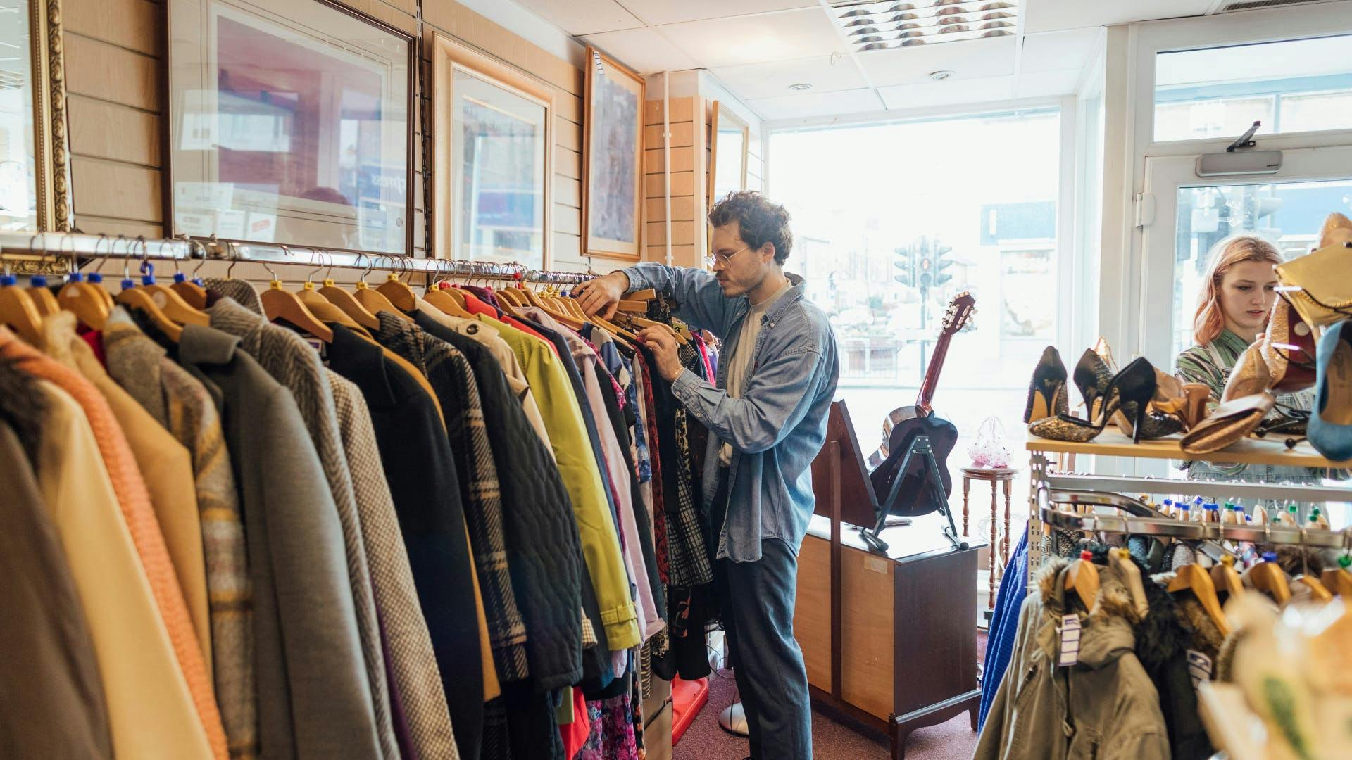 A man a woman goes trough a store.