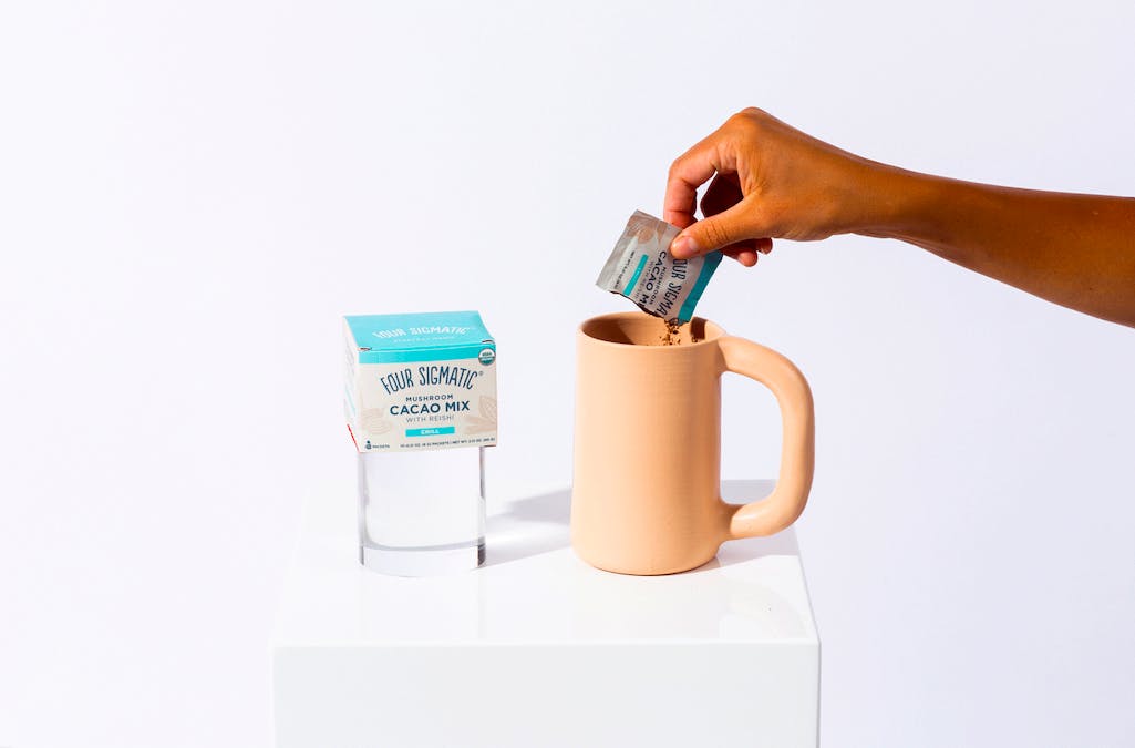 Reishi cacao pouring into mug