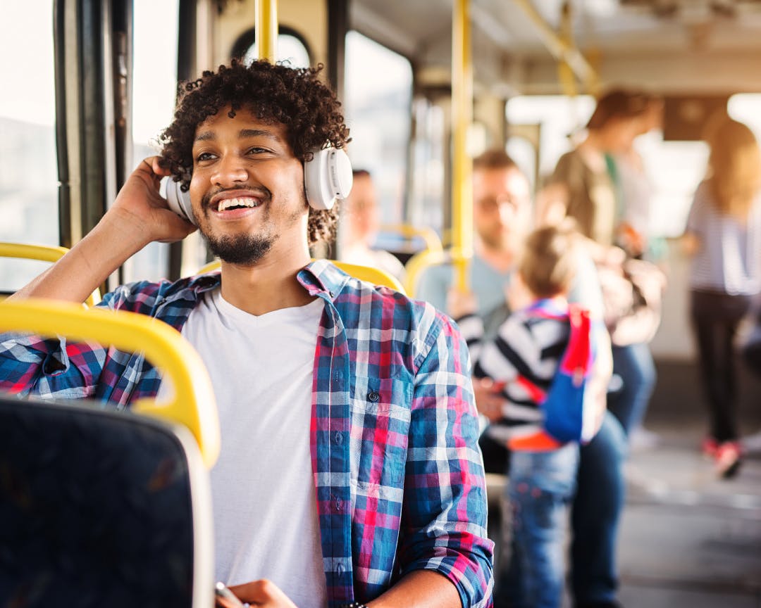 man sat on bus
