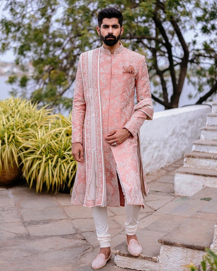 pastel shades mehndi outfits for grooms