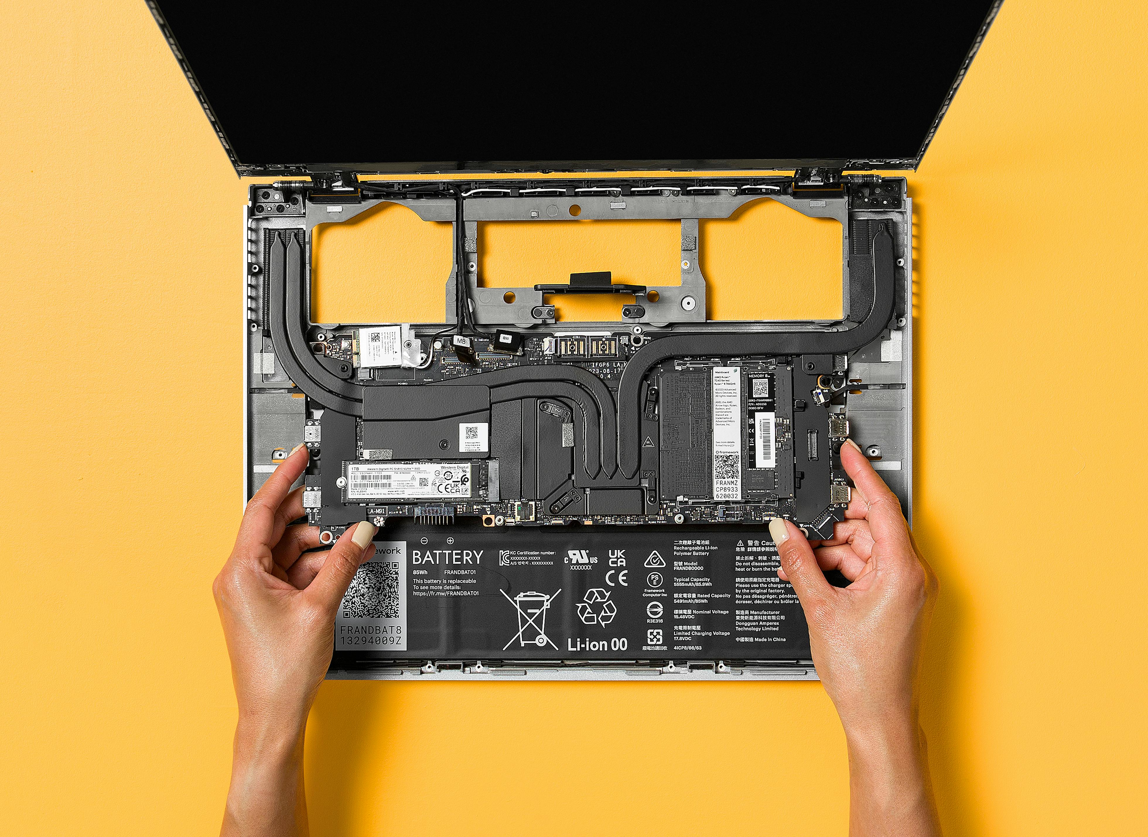 Holding a Framework Laptop 16 module