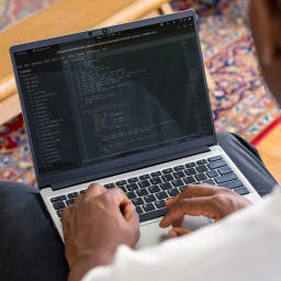 Photo of a person typing on a Framework Laptop 13