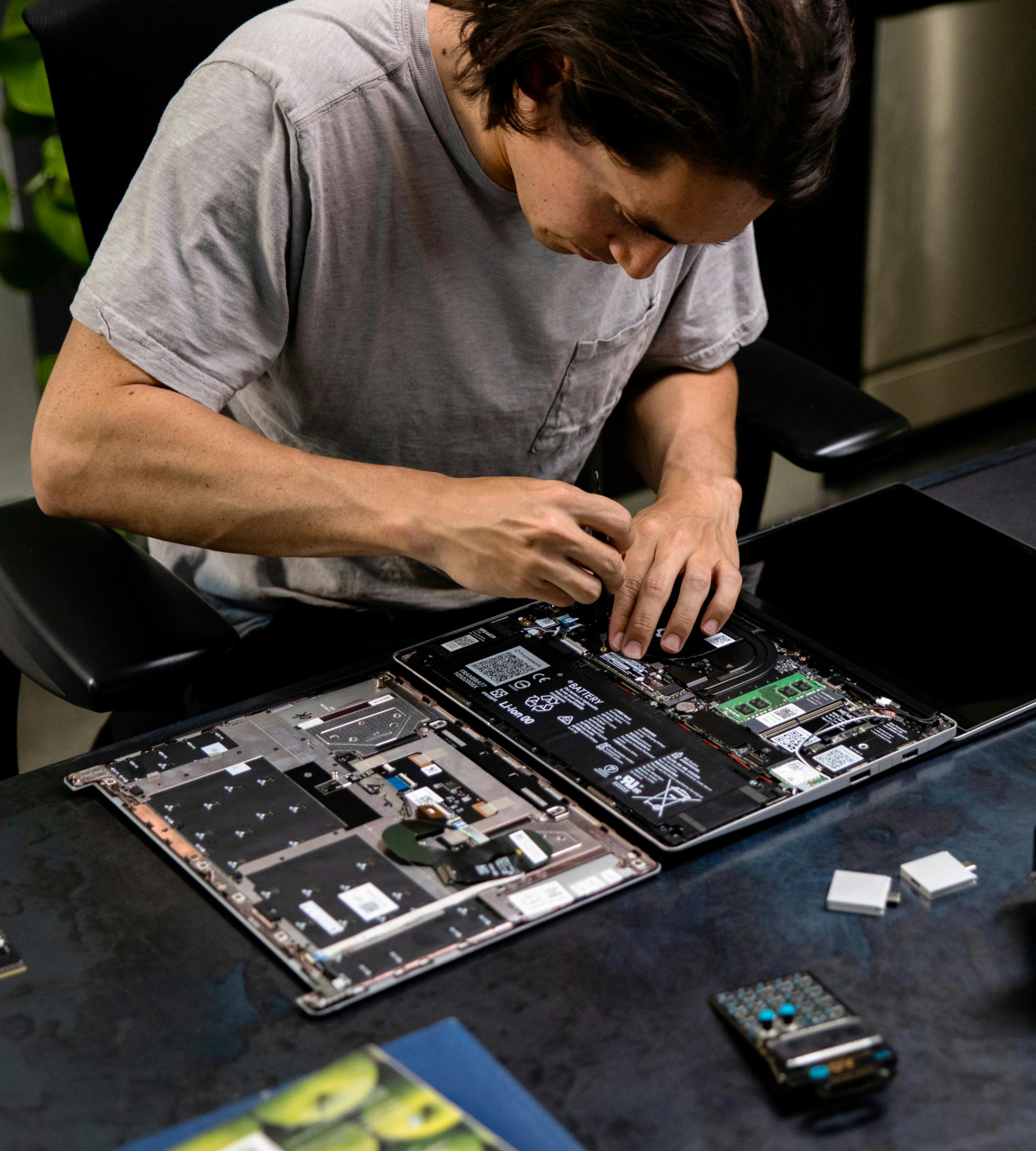 A person assembling Framework Laptop