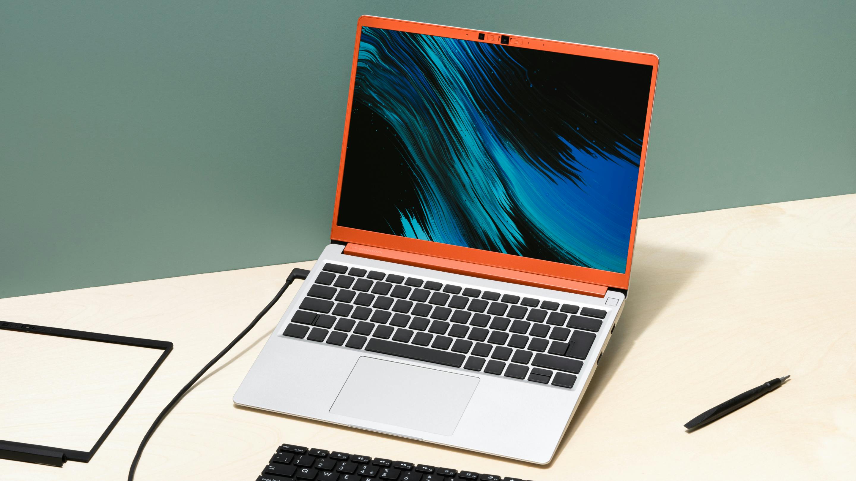 Framework Laptop with parts around