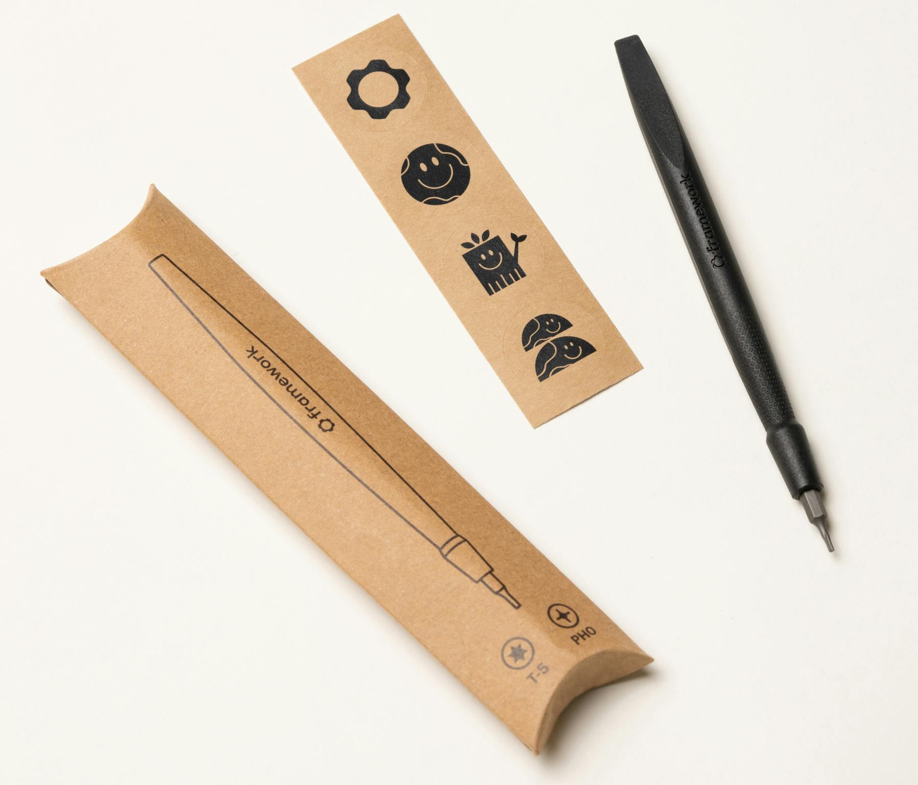 Framework screwdriver with packaging and sticker sheet