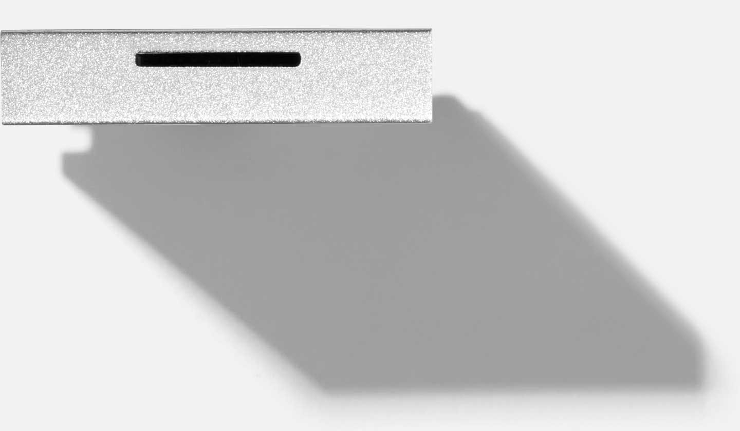 Top-down studio shot of a Framework MicroSD Expansion Card.