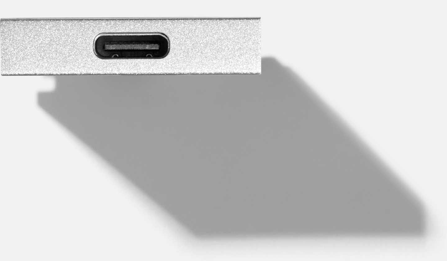 Top-down studio shot of a Framework USB-C Expansion Card.
