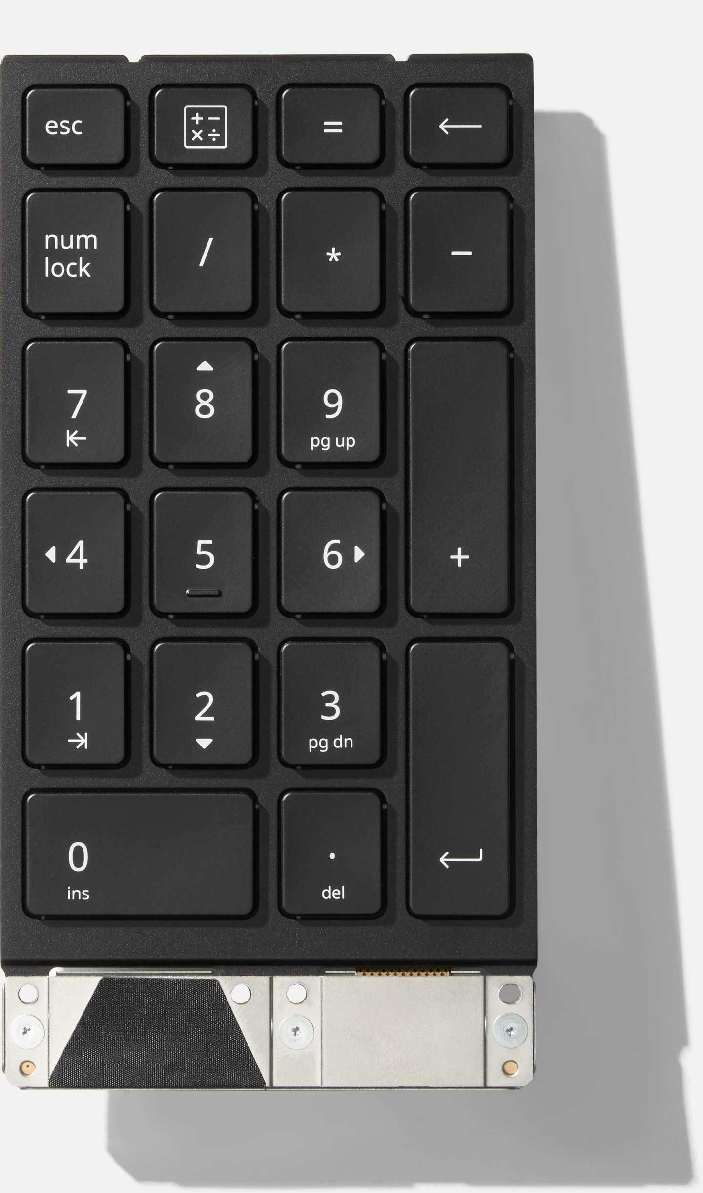 Top-down studio shot of a Framework 16 Numpad.