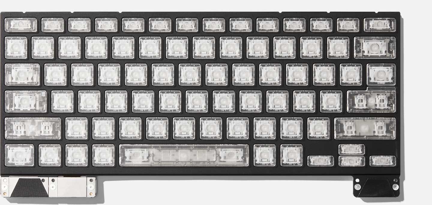 Top-down studio shot of a Framework 16 Clear Keyboard.
