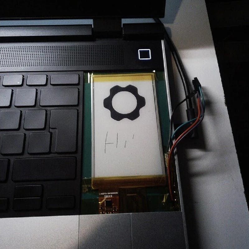 Close-up shot of an E-Ink module prototype for Framework Laptop 16.