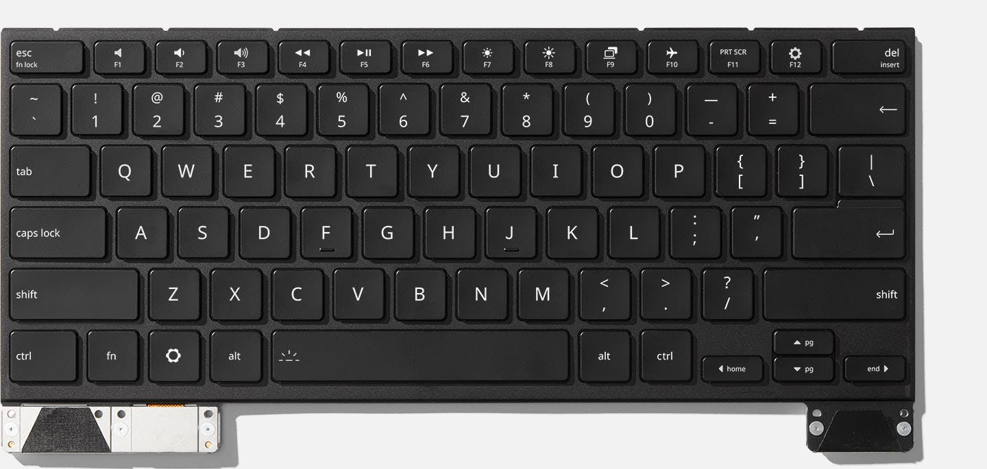 Top-down studio shot of a Framework 16 RGB Keyboard.