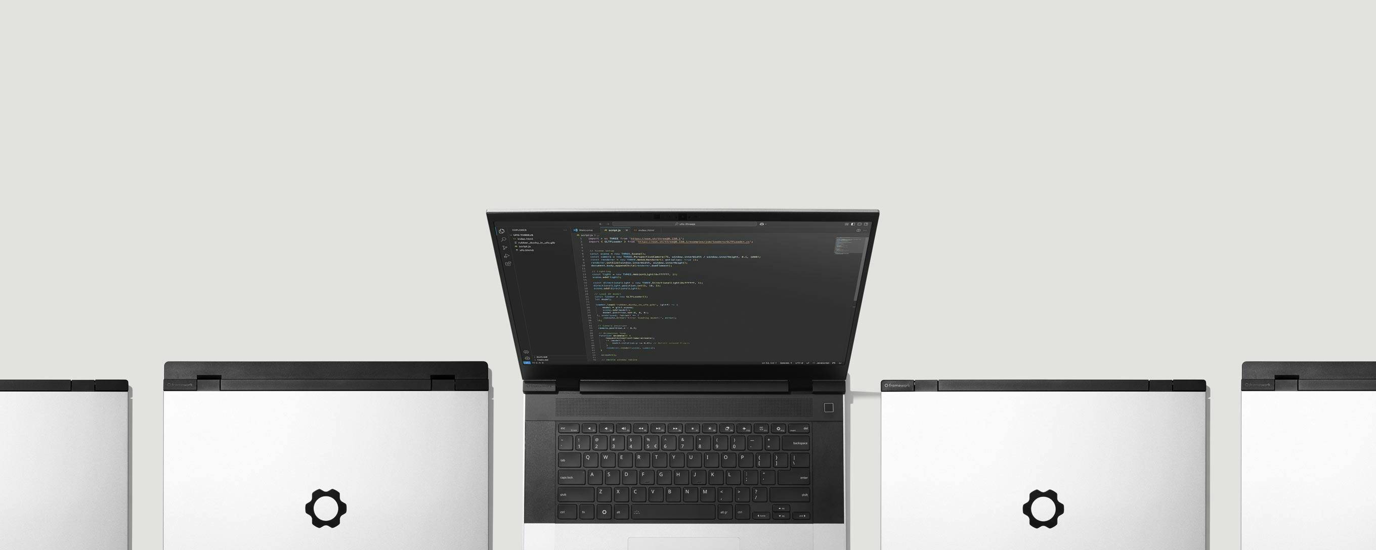 Top-down studio shot of multiple Framework Laptops 16s.