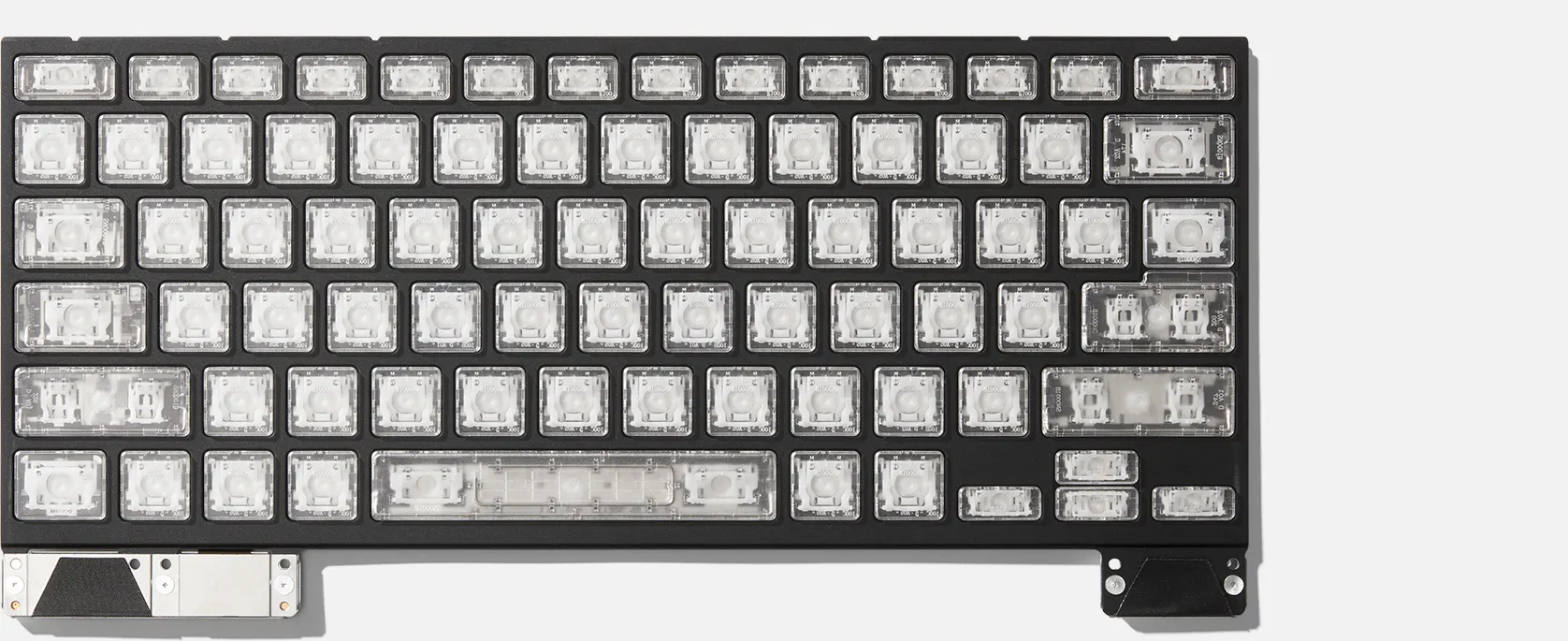 Top-down studio shot of a Framework 16 Clear Keyboard.