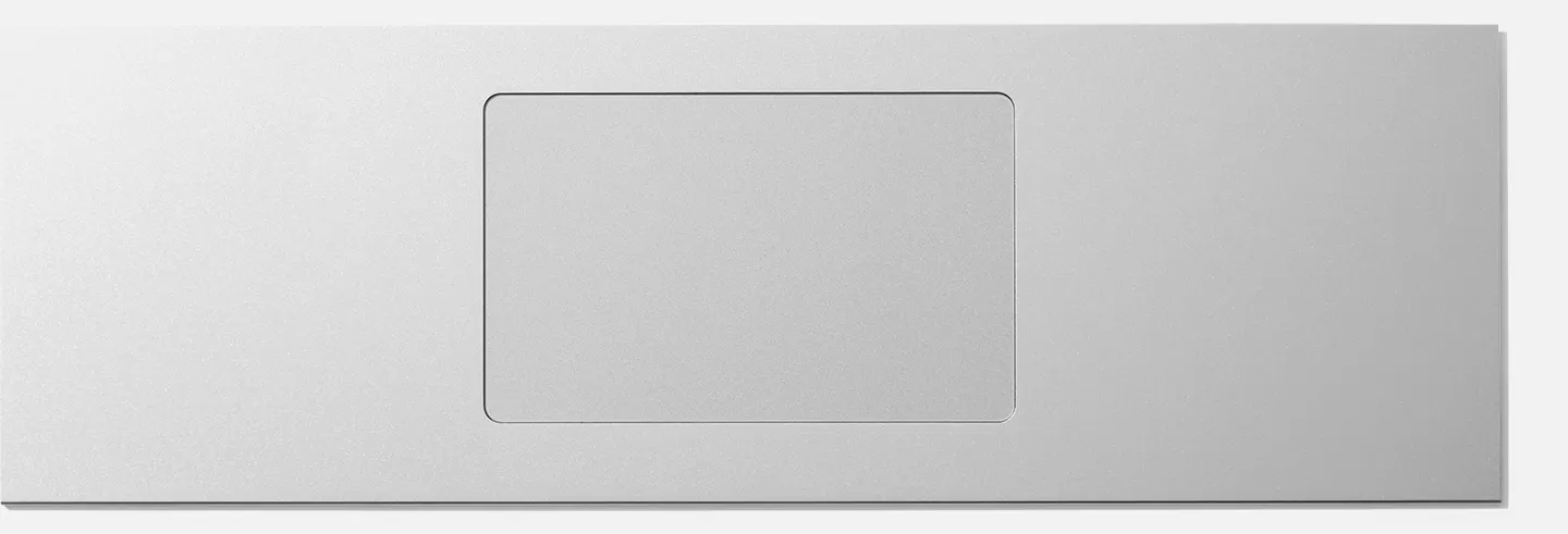 Top-down studio shot of a Framework 16 One Piece Haptic Touchpad.