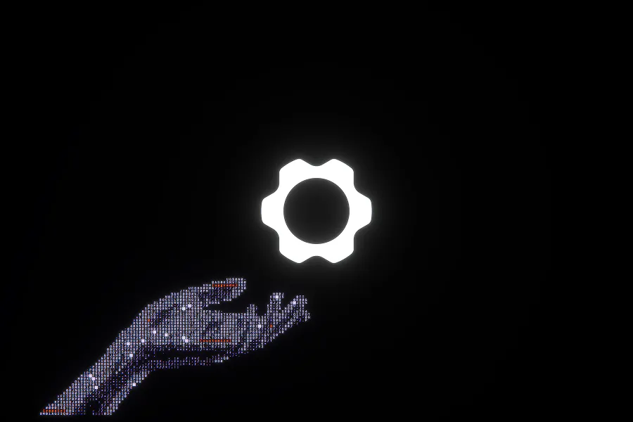 A minimalist black wallpaper featuring a glowing white Framework gear logo floating above a hand made of shimmering digital code and terminal text.