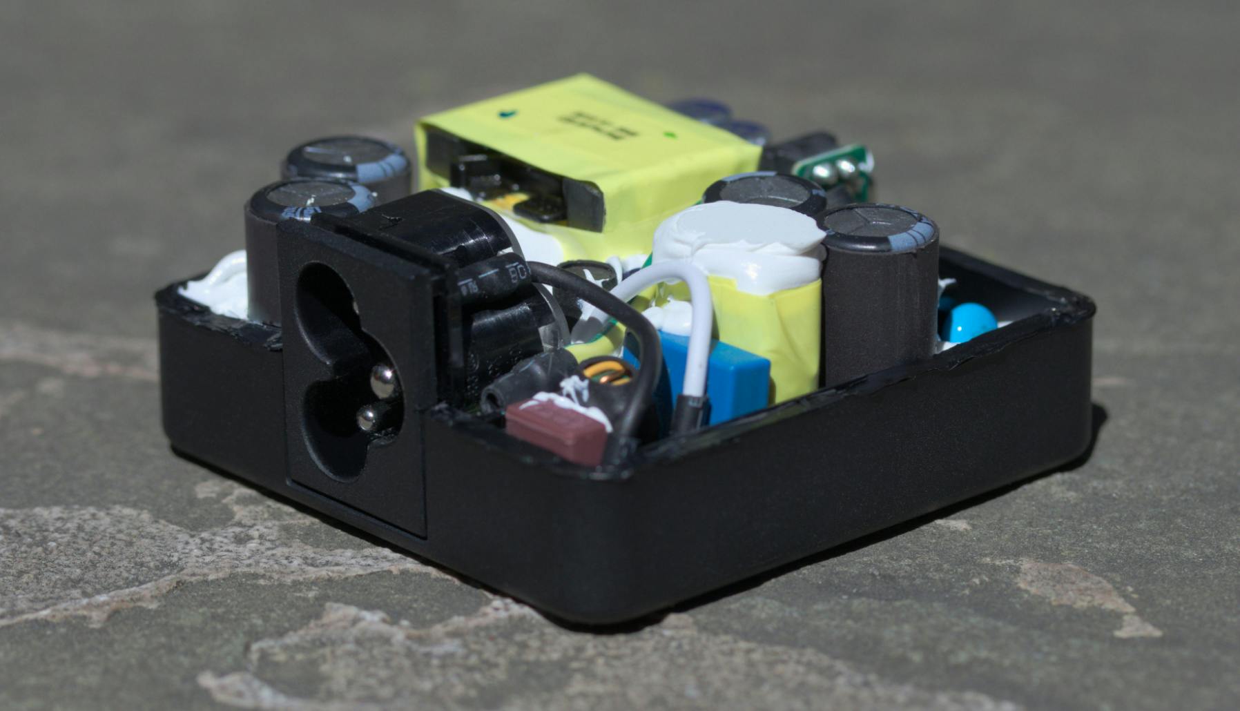 Power adapter with exposed internals