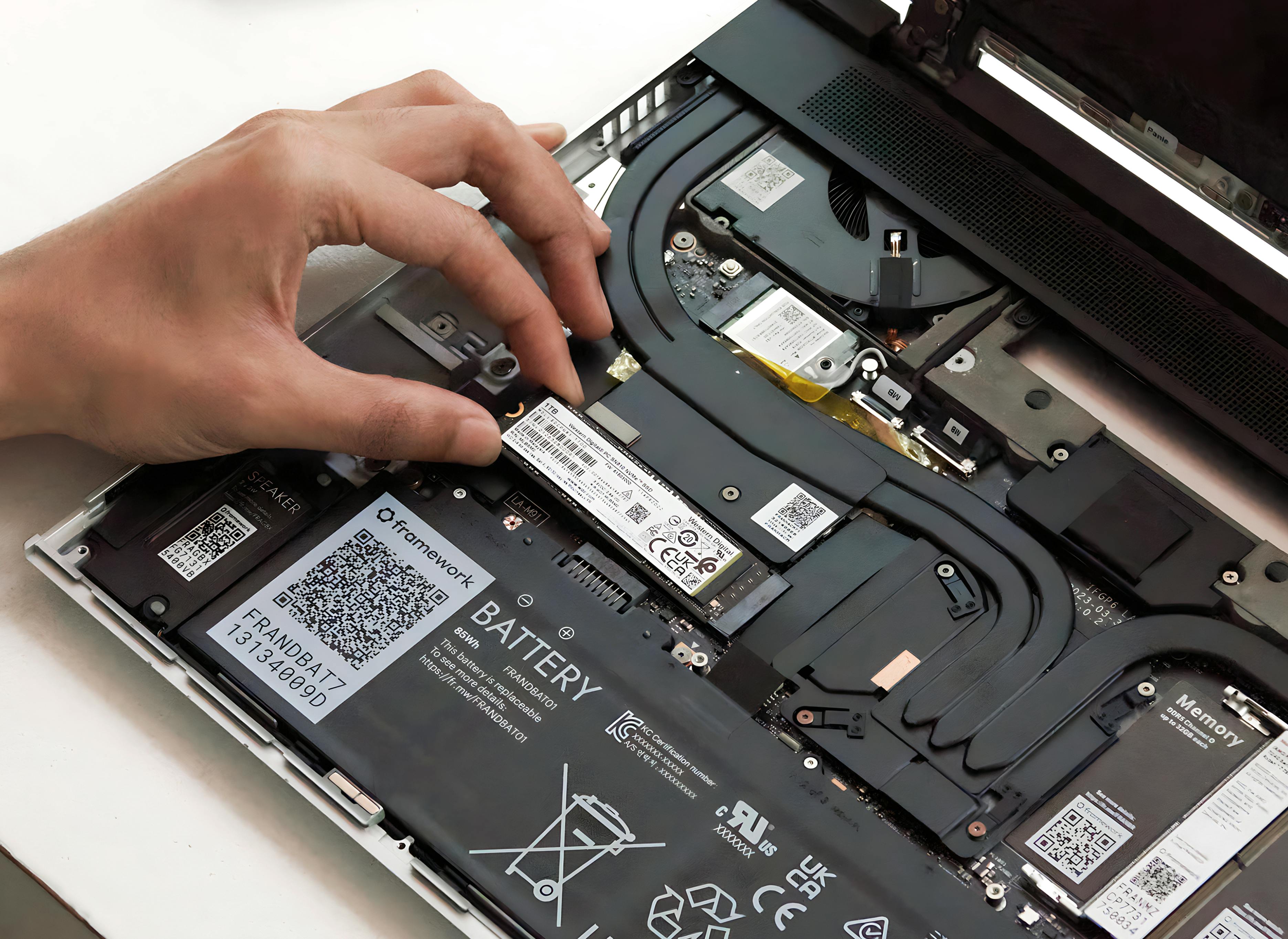 Inserting a storage module in the Framework Laptop