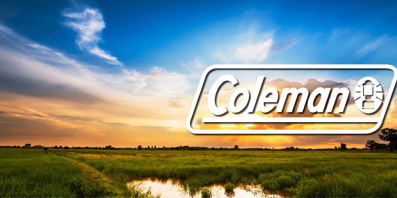 Coleman slider with sunset overlooking field