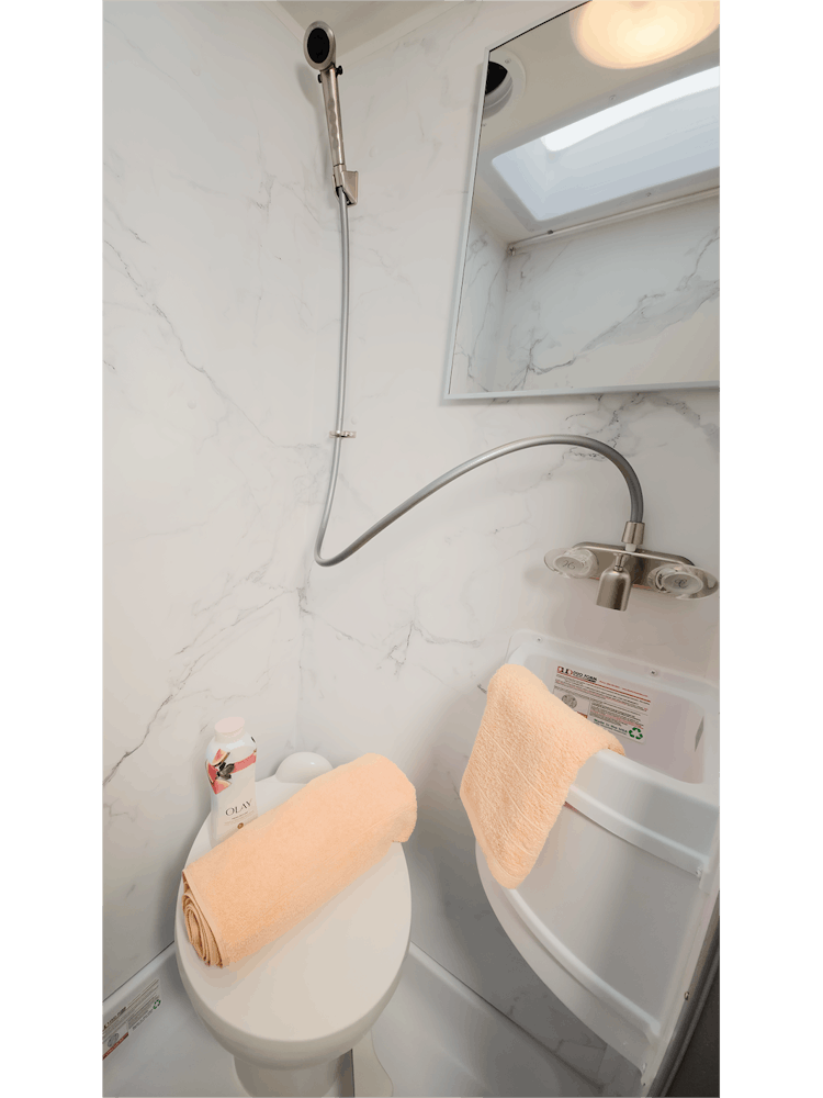 2026 Coleman 19EZ Blue Mist Coastline Grey Bathroom